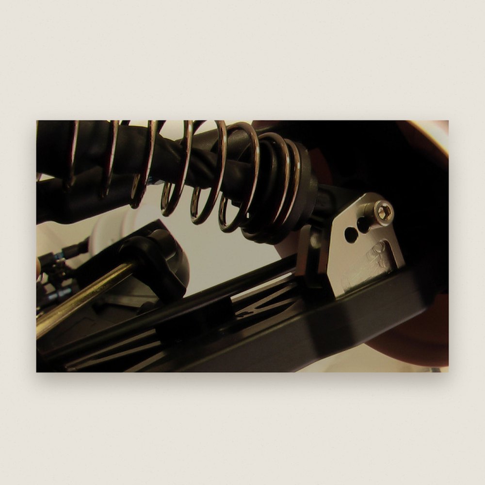 Lower Rear Shock Mounts, Hard Anodized - Hot Racing